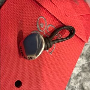 UNO de 50 Silver Cuff Link with Black Leather Loop